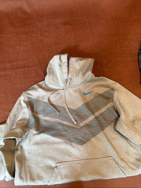 Nike Gray Hoodie with Blue Swoosh and Chevron Detail